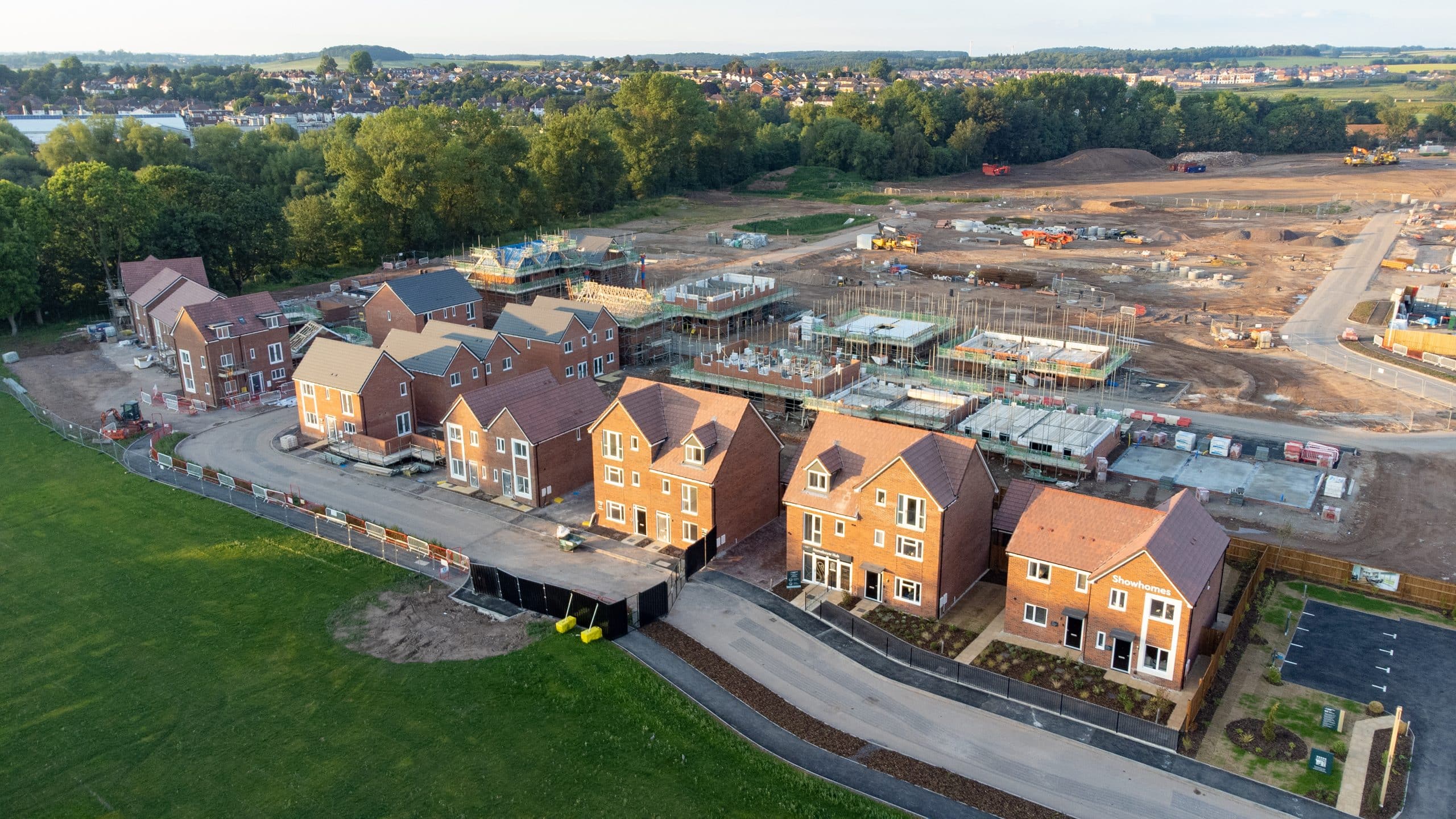 Aerial view looking down on new build housing construction site in England, UK