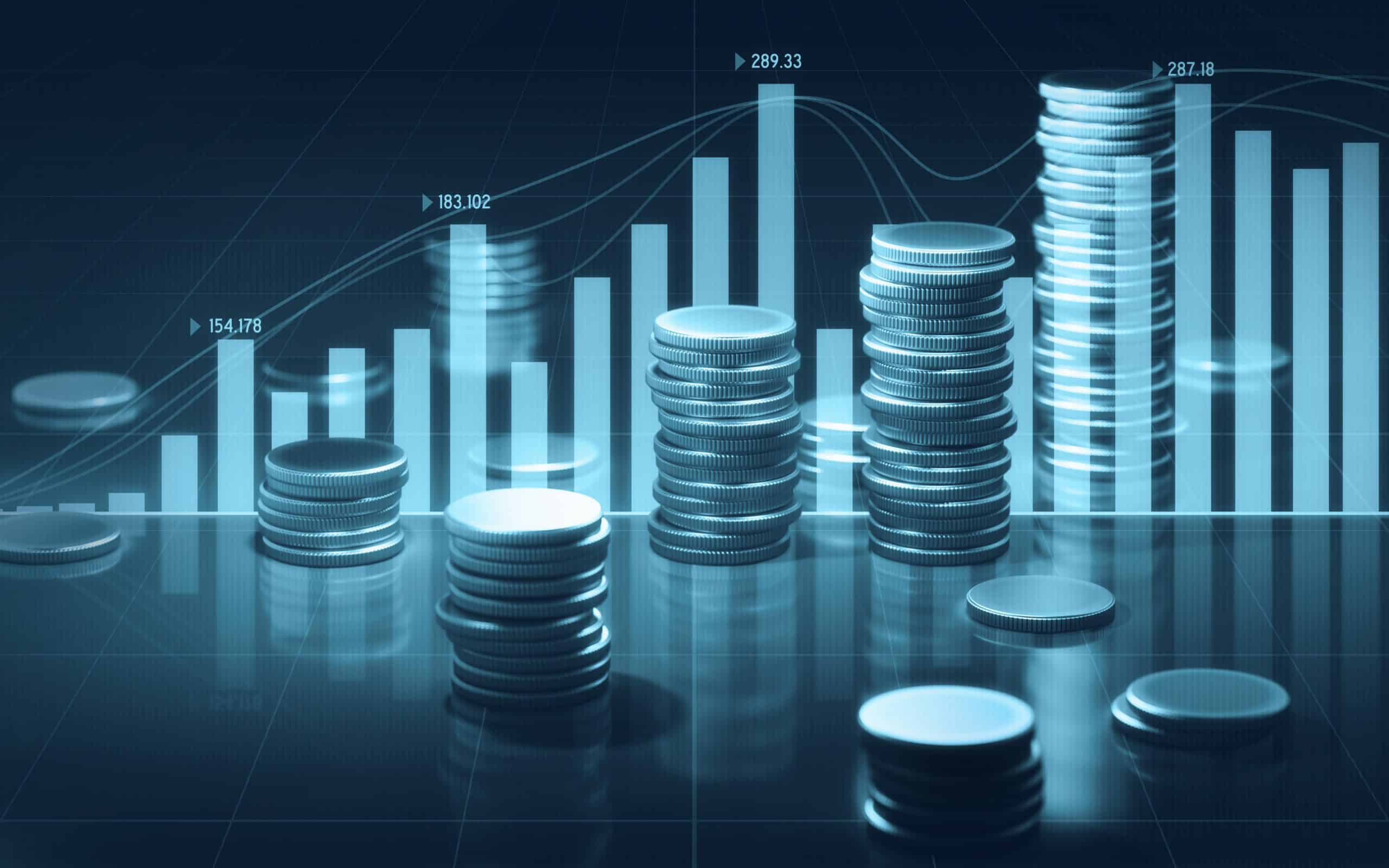 Coin stacks and blue bar and line graphs on black background. Horizontal composition with selective focus and copy space.