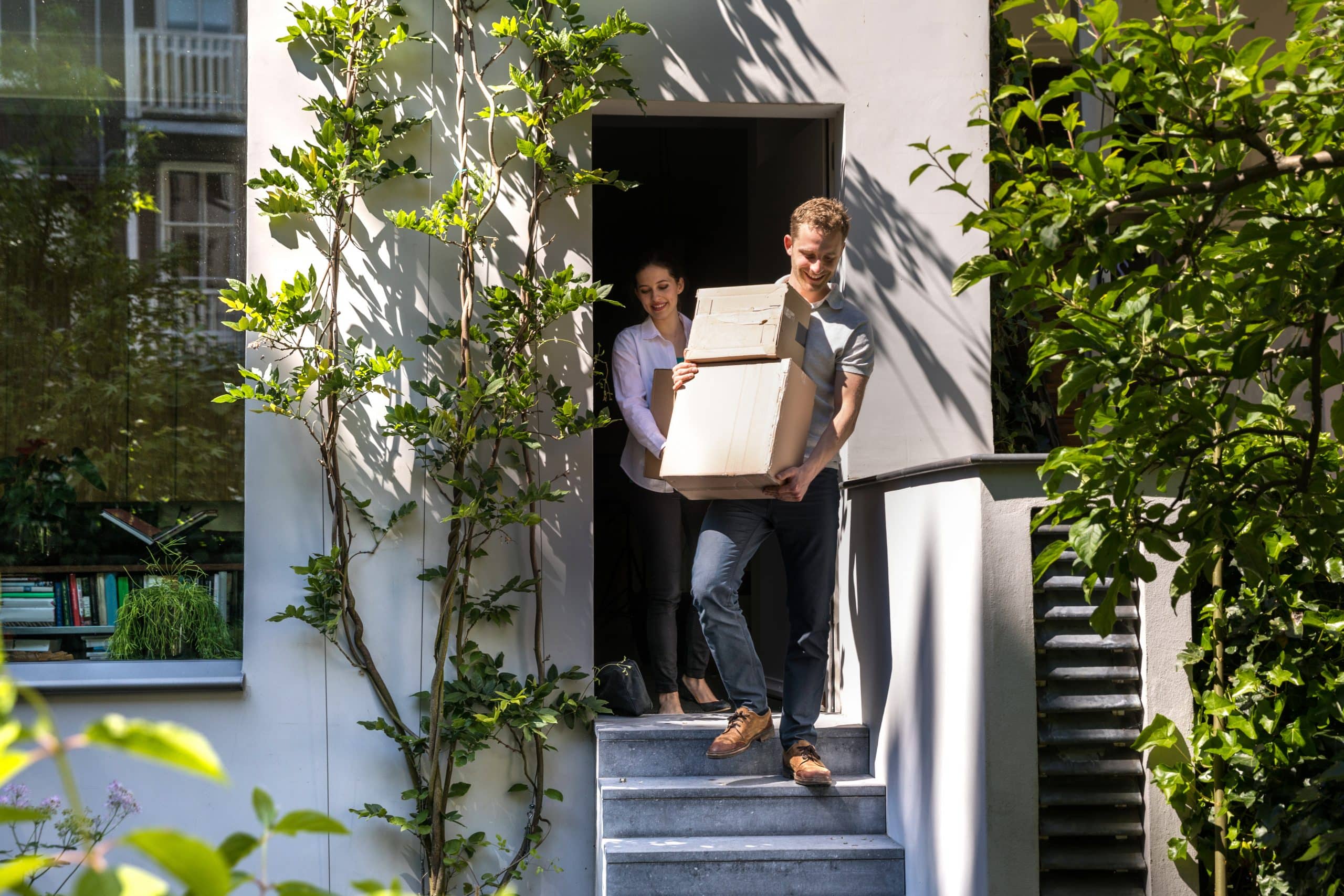 Young couple Moving Into a New House